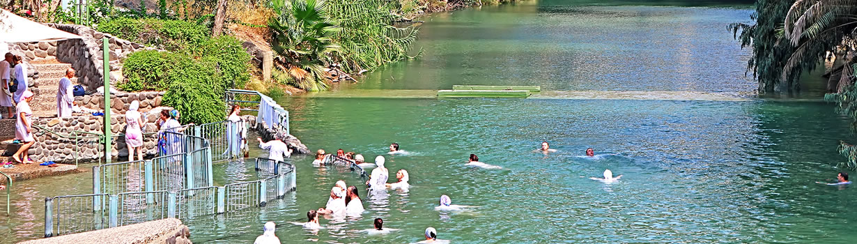 Baptism on Christian Tour at the Jordan River